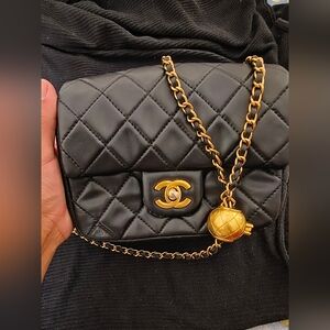 CHANEL Black Quilted Leather Crossbody with Gold Chain and CC Lock